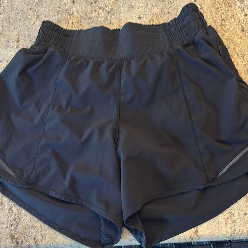 Lululemon hottie hot shorts 4” size 4 but w drying probably more like a small 4
